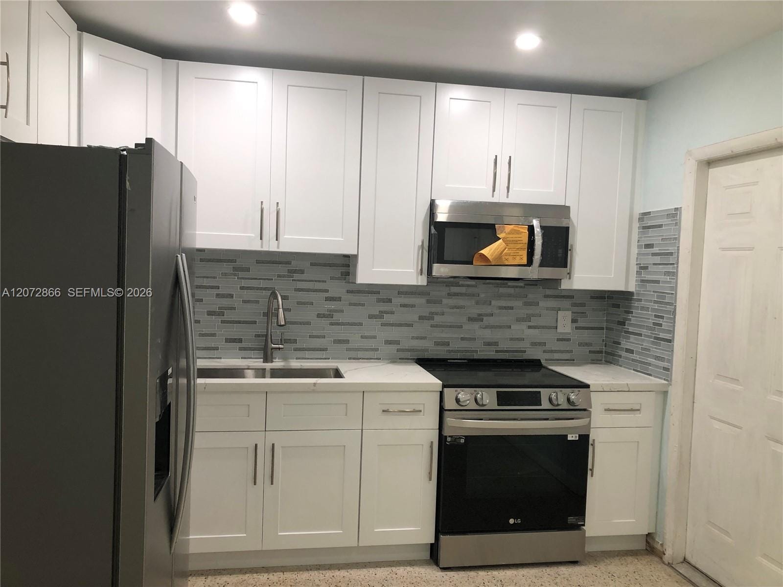10831 NE 2nd Court — photo 8