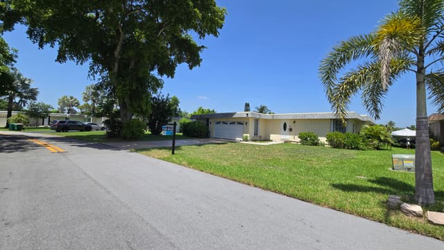 6311 NW 71st Avenue, sold in Mainlands Of Tamarac Lakes, Tamarac, FL
