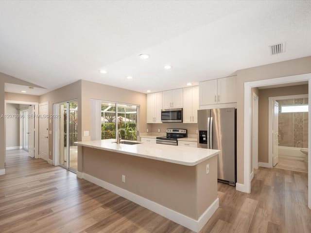 1404 Silverleaf Oak Court, sold in ZIP 33410, Palm Beach Gardens, FL