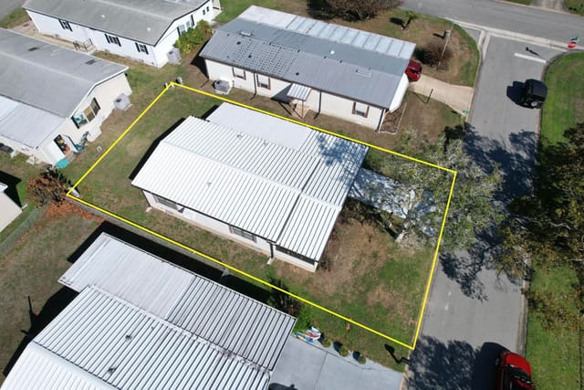 1212 Paurotis Drive, Barefoot Bay, FL 32976