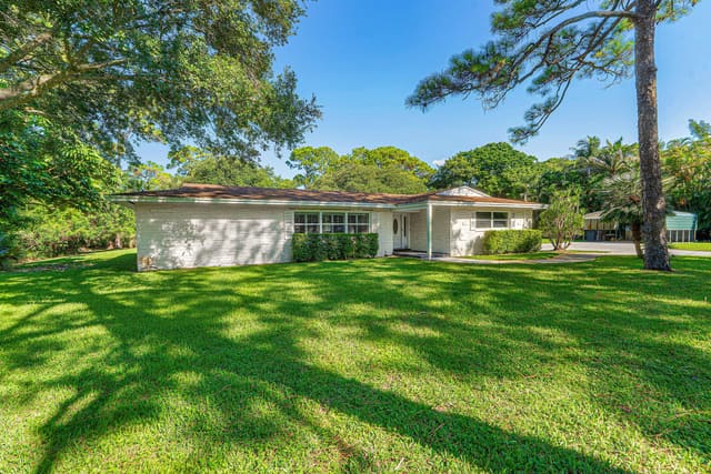 8645 Square Lake Drive, sold in ZIP 33418, Palm Beach Gardens, FL