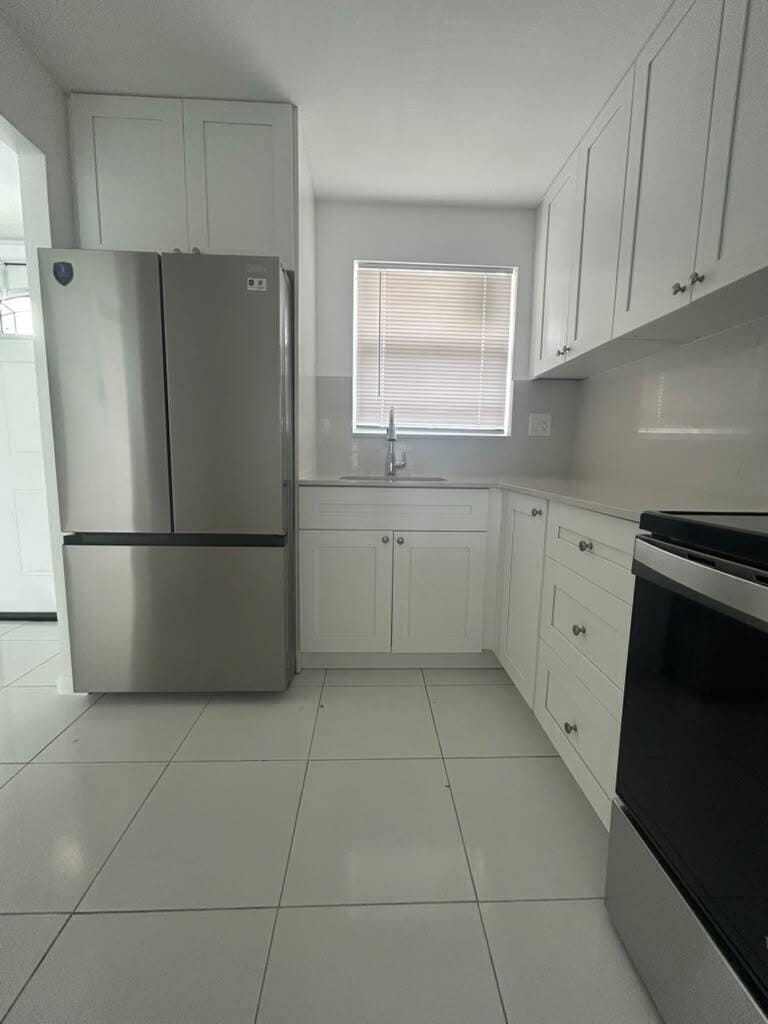 2881 N Pine Island Road 208 — photo 7