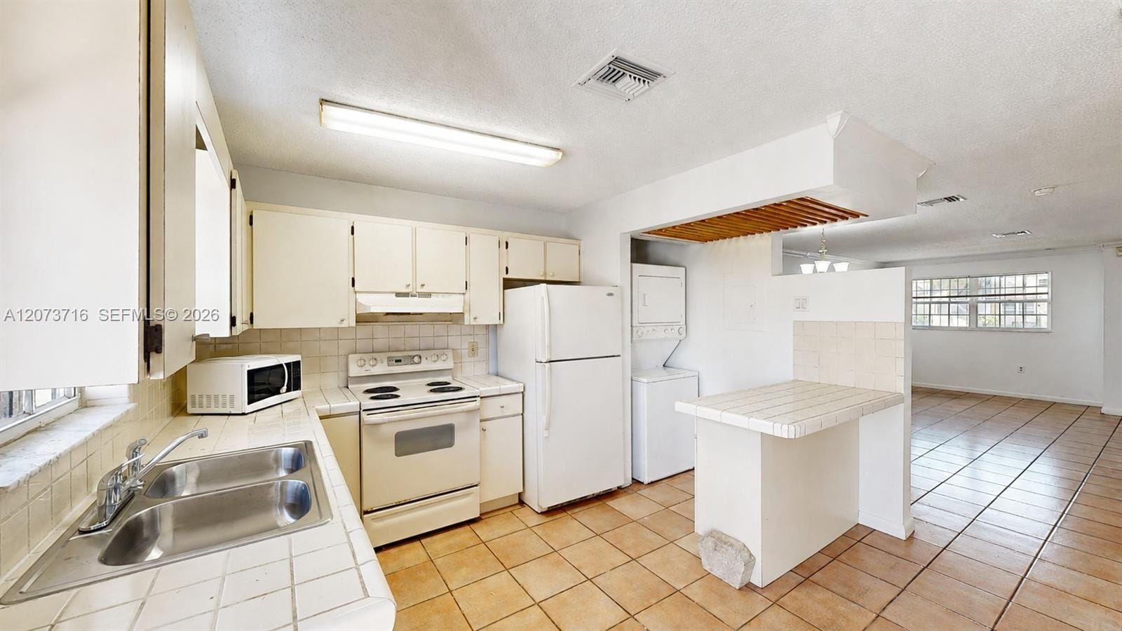 6415 SW 129th Place 2403 — photo 3