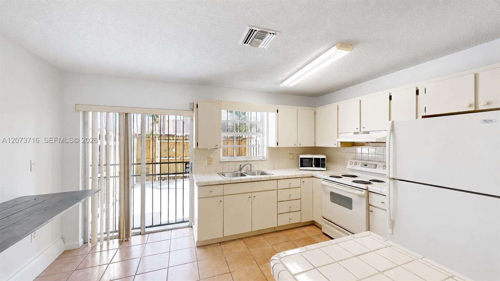 6415 SW 129th Place 2403 — photo 4