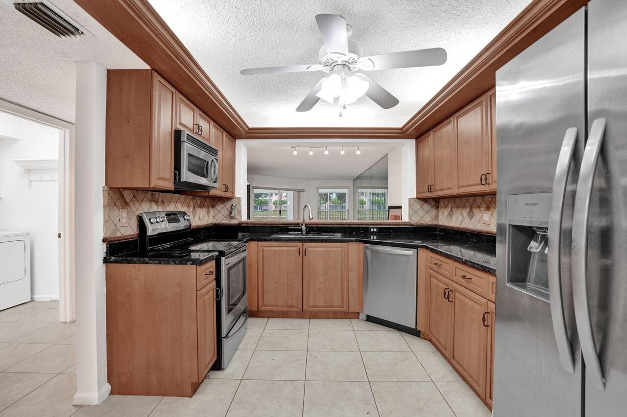 7411 GRANVILLE Drive 106 — photo 3