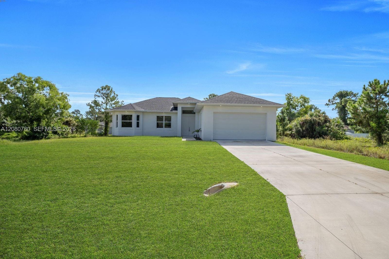 523 Harry Thayer Avenue S, Lehigh Acres, FL 33974