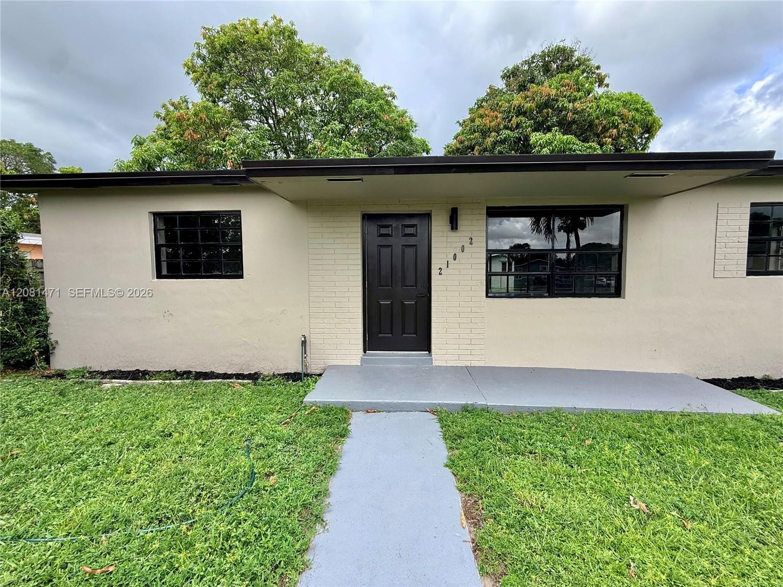 21002 NW 34th Court — photo 3