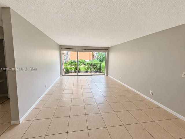 8821 Wiles Road 102, Coral Springs, FL 33067