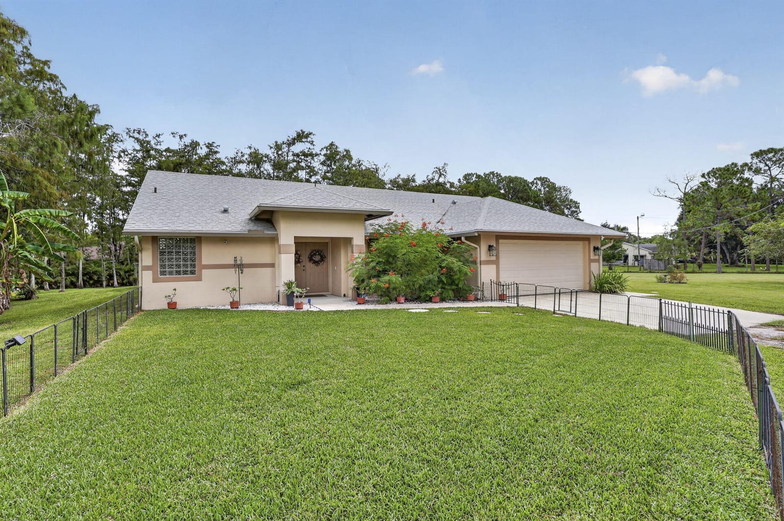 16477 Orange Boulevard, Loxahatchee, FL 33470 - photo 1 of 30