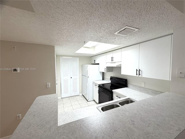 5045 Wiles Road 201, Coconut Creek, FL 33073