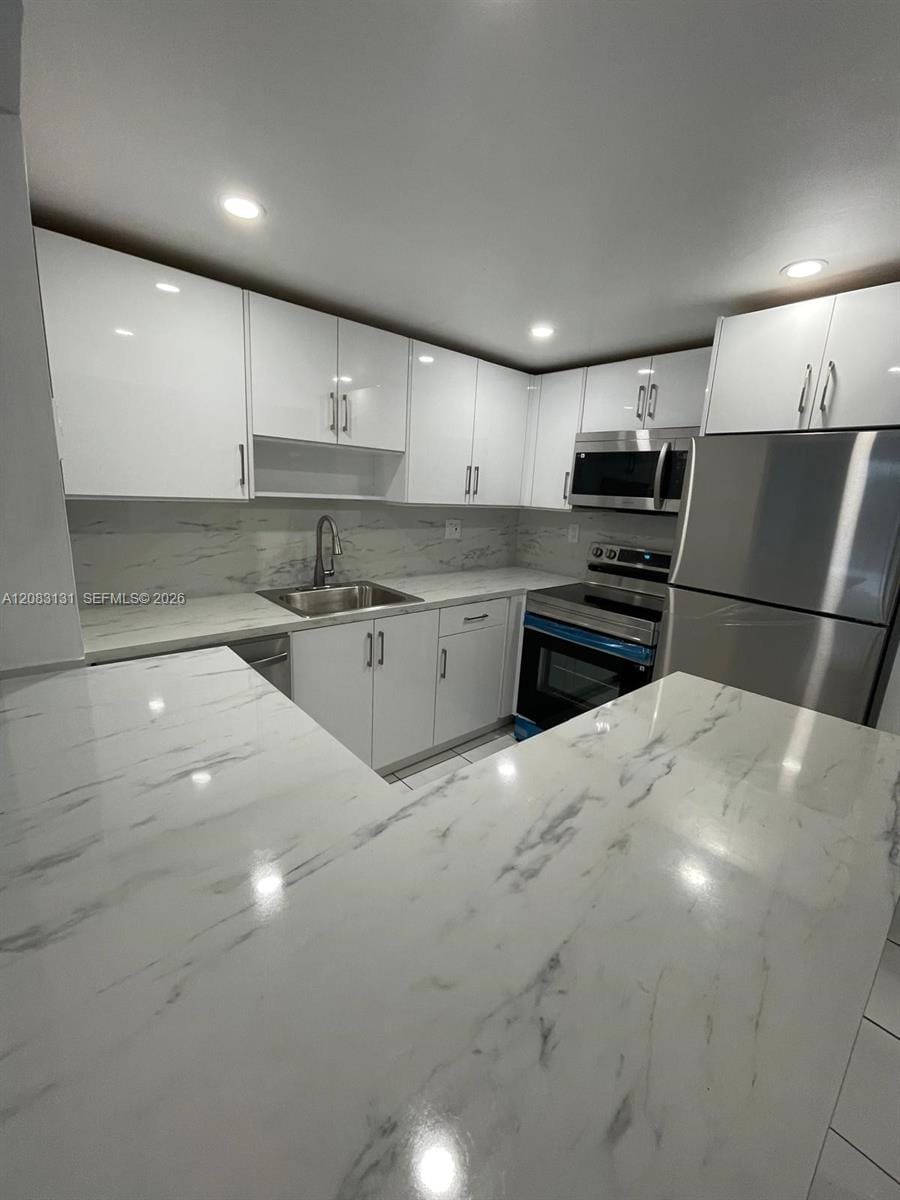 1465 NE 123rd Street 412, North Miami, FL 33161 - photo 1 of 13