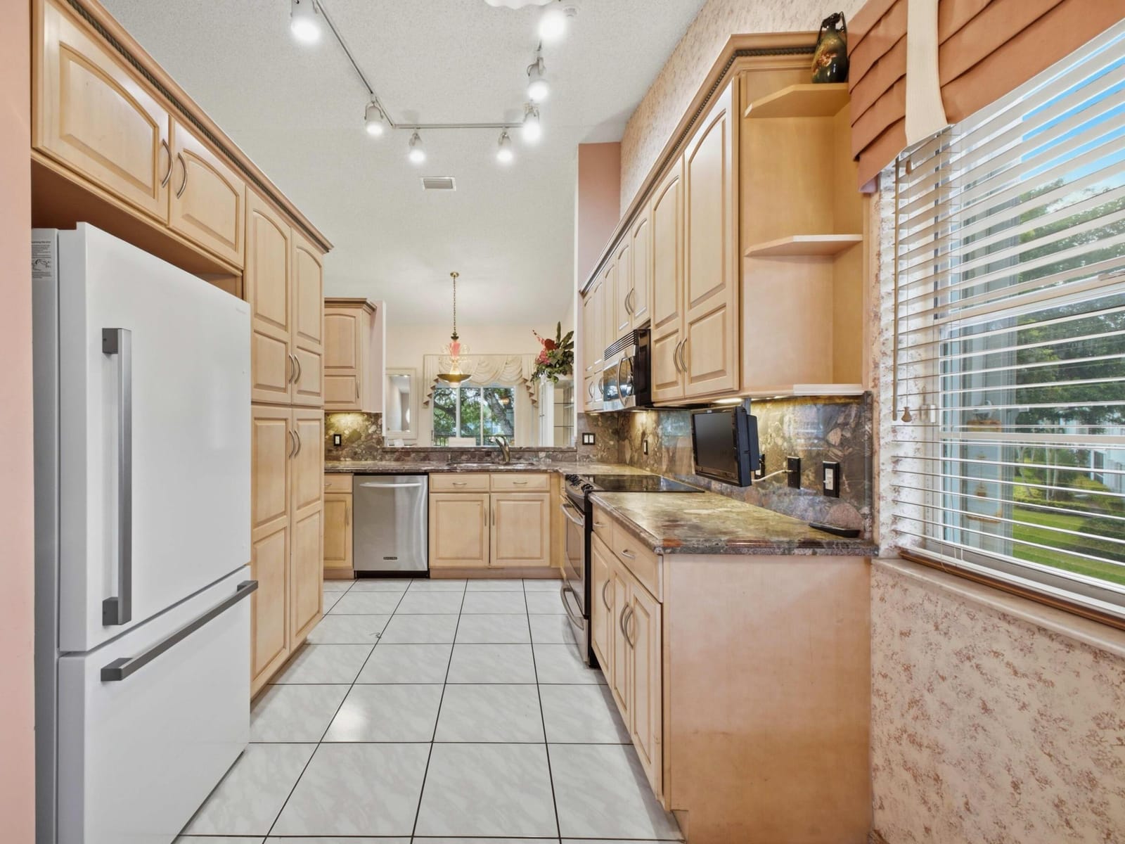 7881 WHISPERING PALMS Drive 202 — photo 9