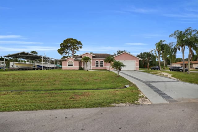 202 SE Grove Avenue, Port St. Lucie, FL 34983