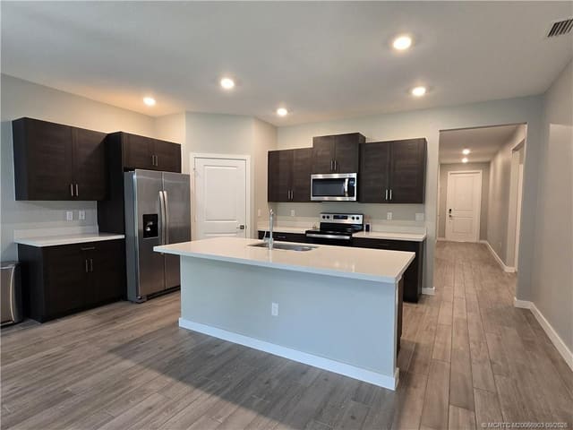 1404 NE White Pine Terrace, Ocean Breeze, FL 34957