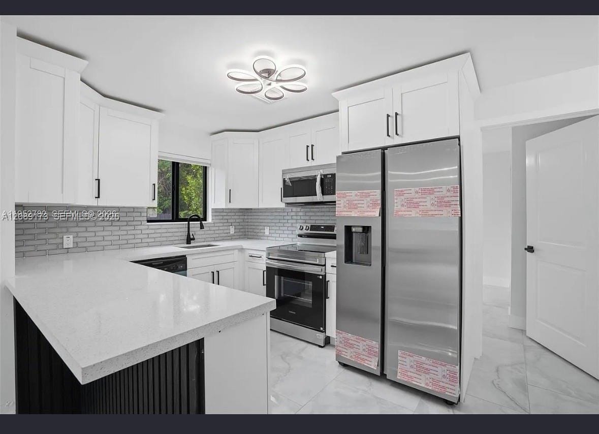 1411 NW 40th Street 1 — photo 3