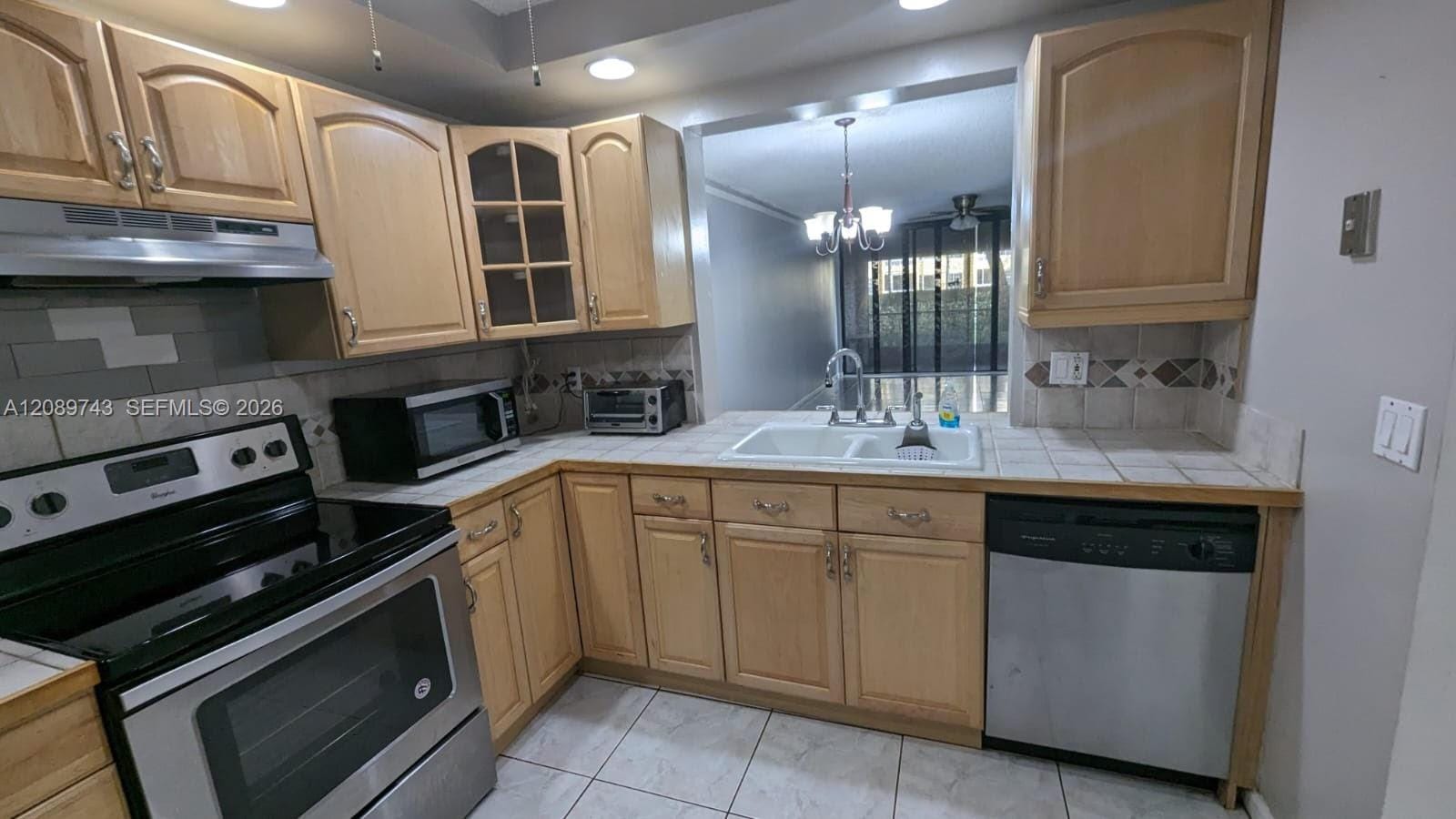 8592 W Sunrise Boulevard 105 — photo 2