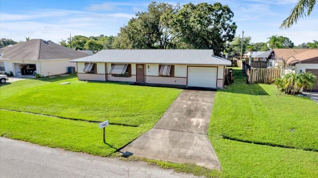 412 SE Dalva Avenue, Port St. Lucie, FL 34984