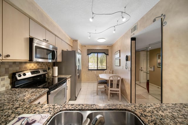 6037 POINTE REGAL Circle 307, Delray Beach, FL 33484