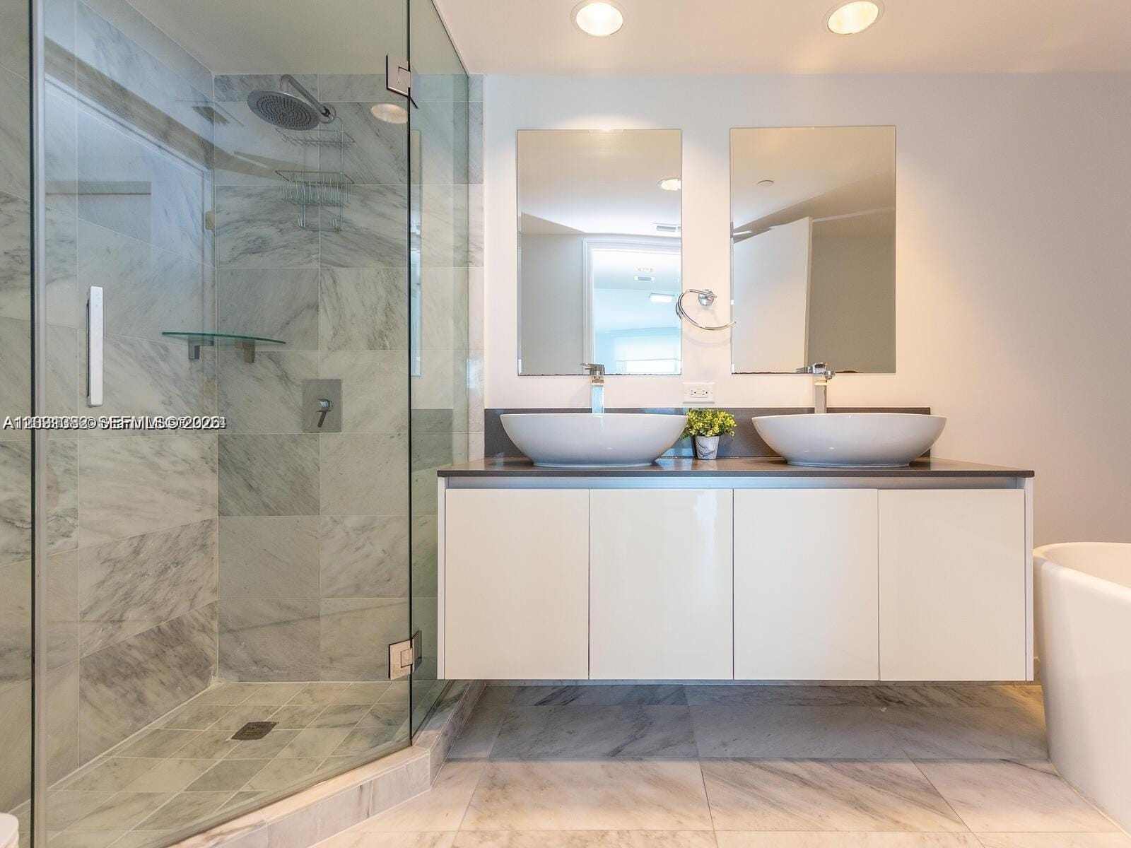 9821 E Bay Harbor Drive 703 — photo 7