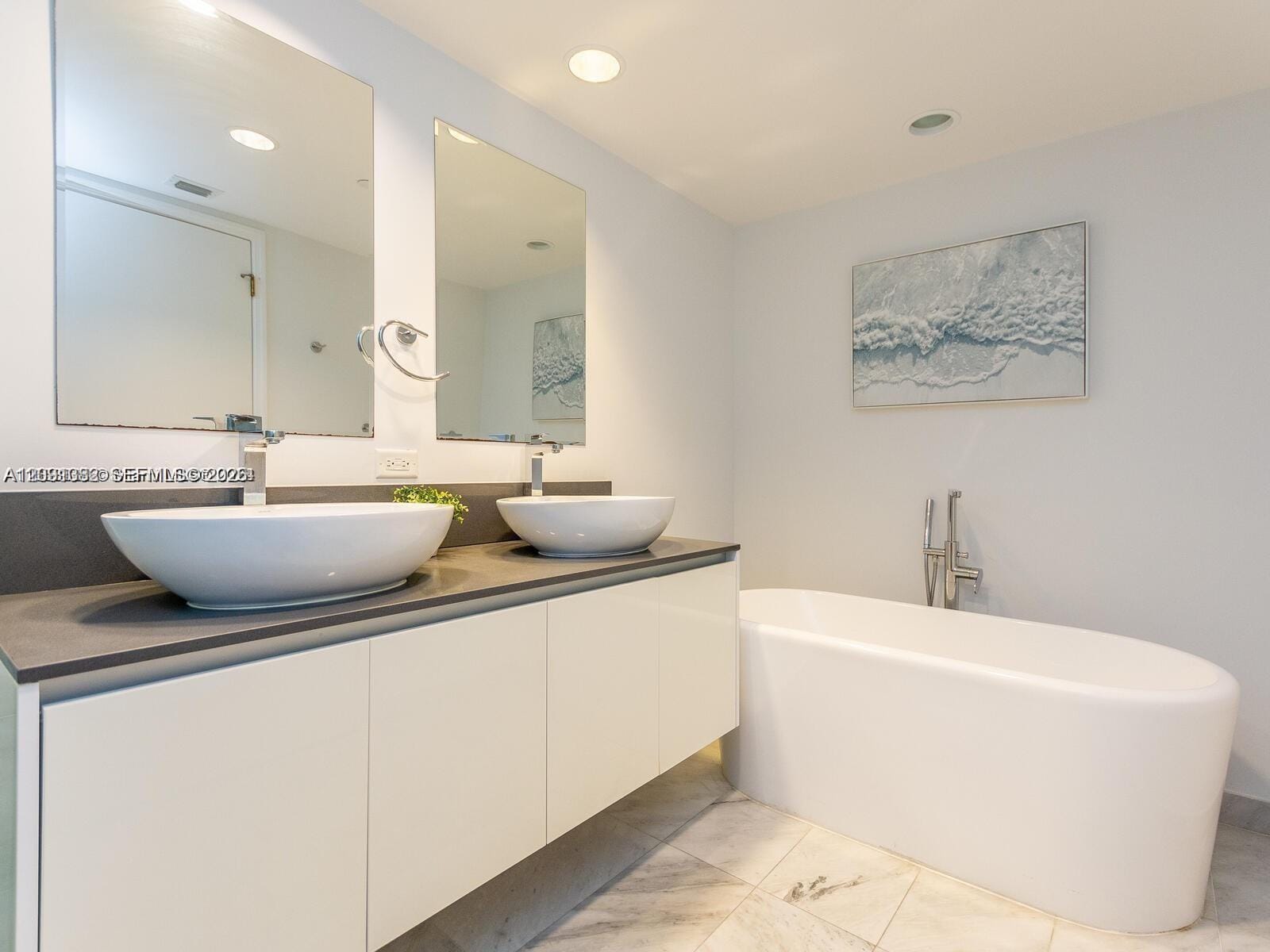 9821 E Bay Harbor Drive 703 — photo 8