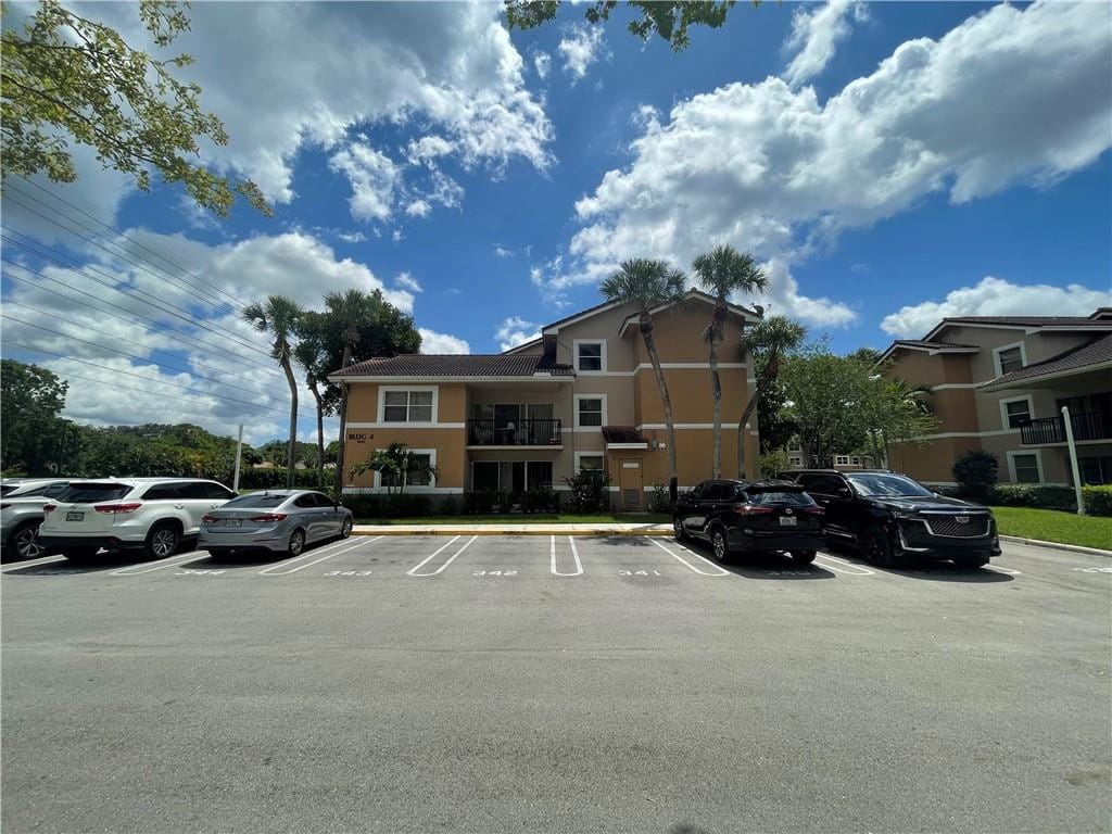 9033 WILES Road 302, Coral Springs, FL 33067 photo 2