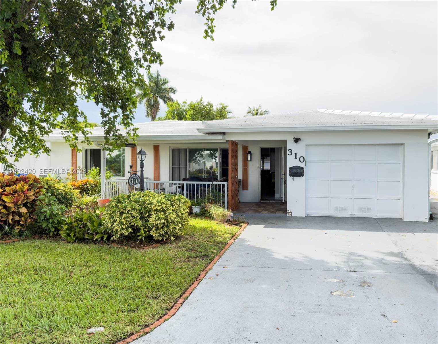 310 NW 25th Court — photo 1