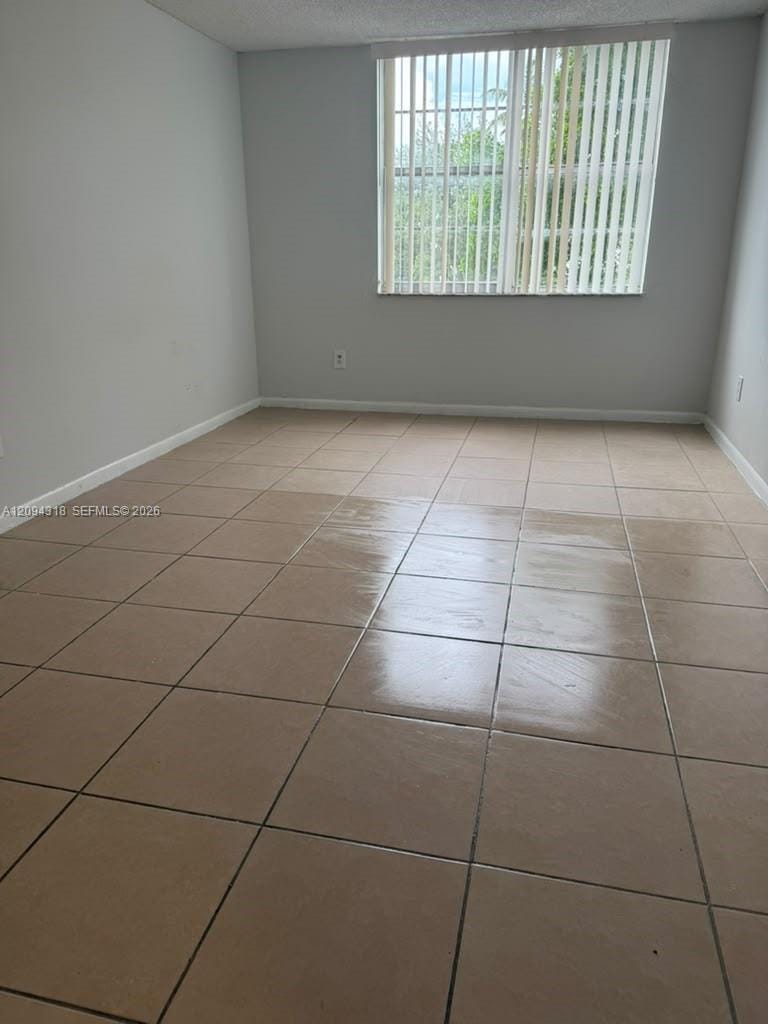 484 NW 165th St Road A-311 — photo 2