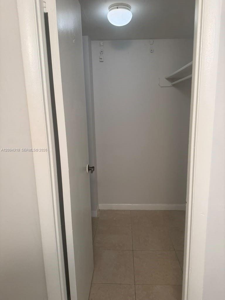 484 NW 165th St Road A-311 — photo 3
