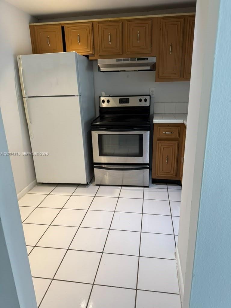 484 NW 165th St Road A-311 — photo 10