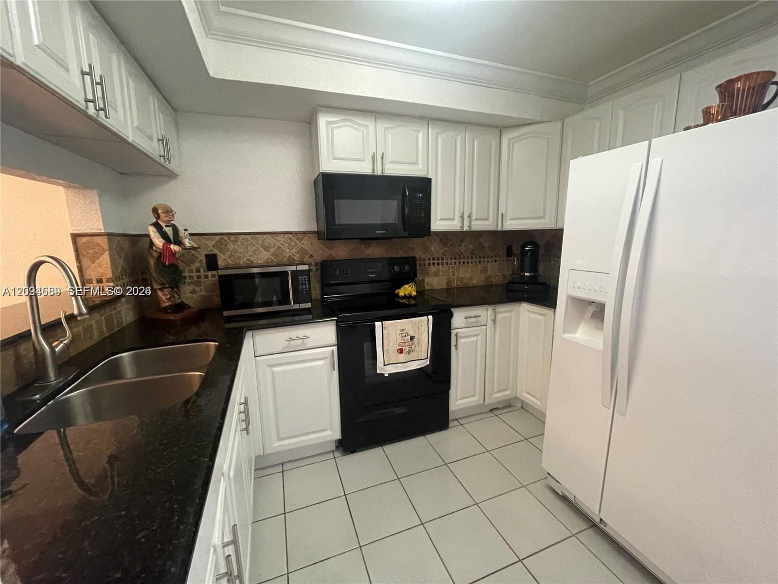 961 W 37th Terrace 30 — photo 3