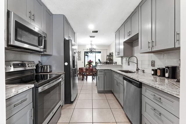 1595 Woodbridge Lakes Circle, West Palm Beach, FL 33406