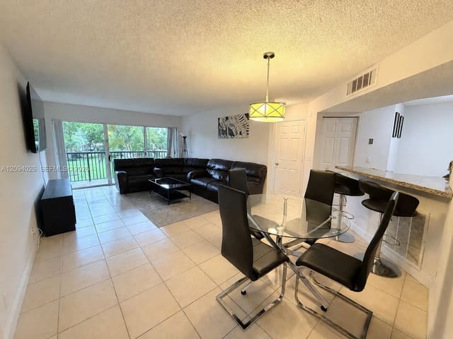 8741 Wiles Road 204, Coral Springs, FL 33067