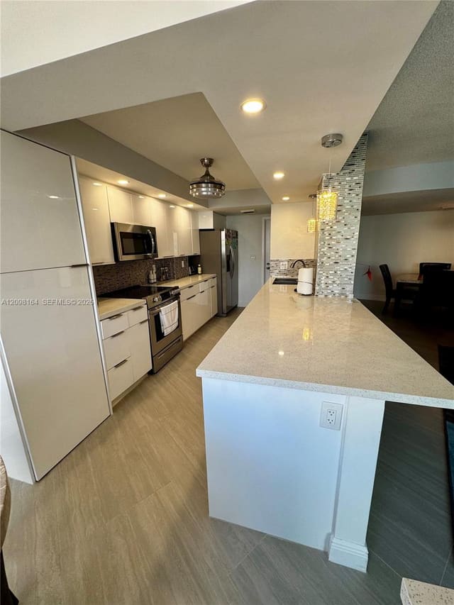 100 Golden Isles Drive 205, Hallandale Beach, FL 33009