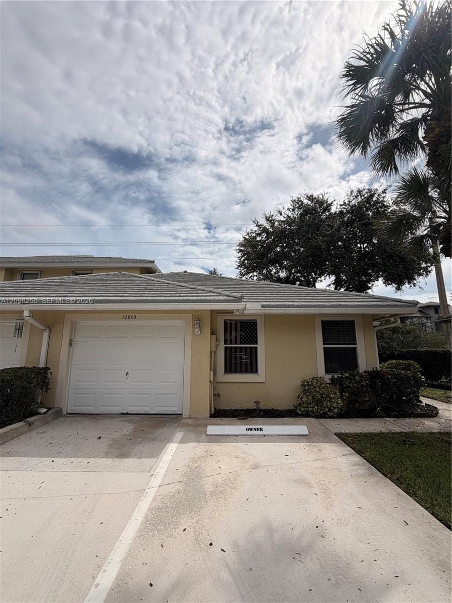 12802 Woodmill Drive, Palm Beach Gardens, FL 33418