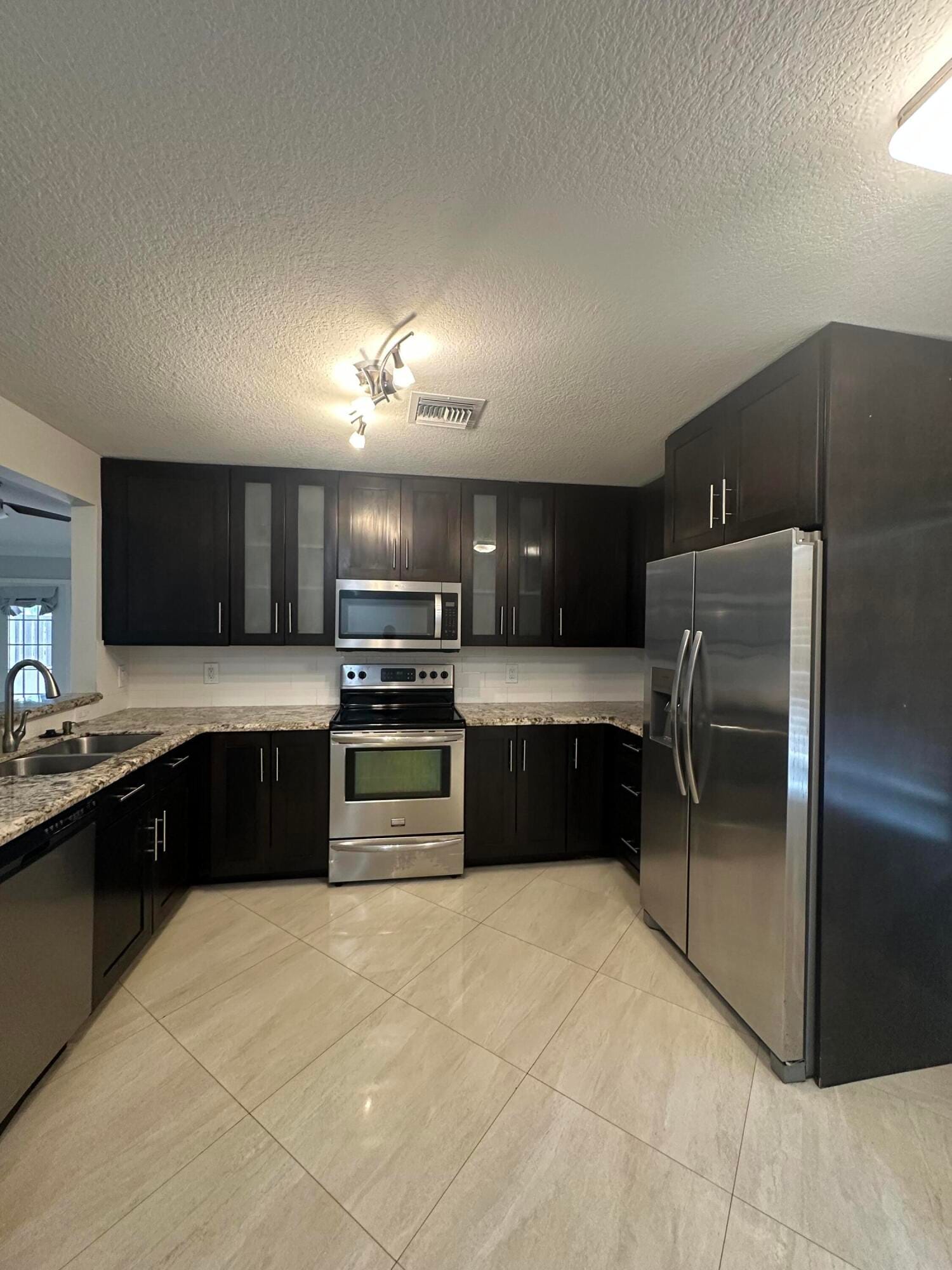 1238 NW 51ST Way 1238 — photo 5