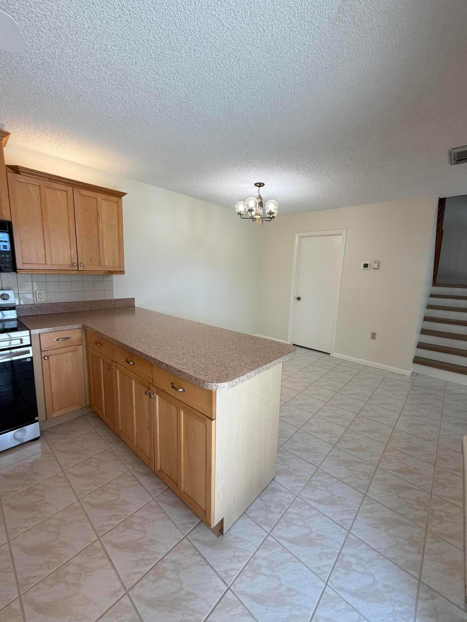 5820 SE WINDSONG Lane 209, Stuart, FL 34997 photo 12