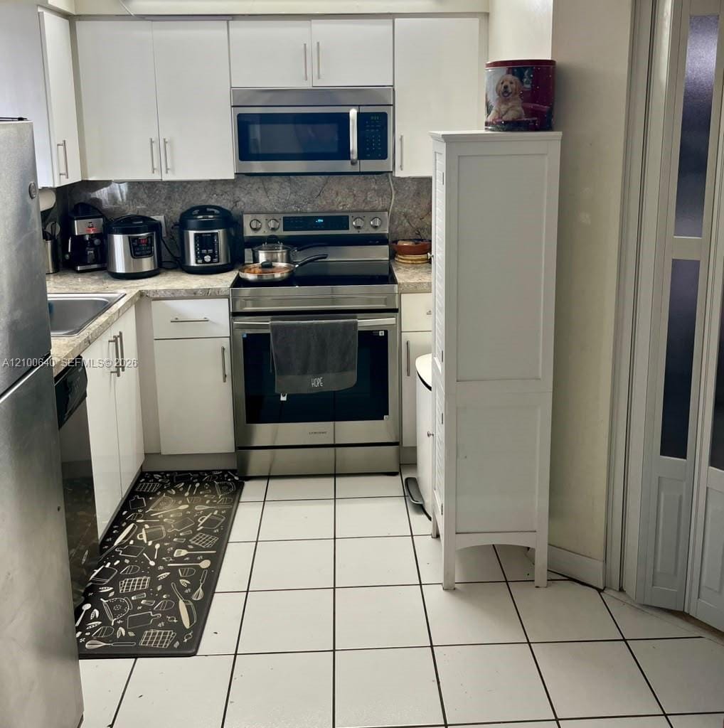 6115 NW 186th Street 301 — photo 10