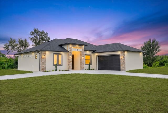 415 Chamonix Avenue S, Lehigh Acres, FL 33974
