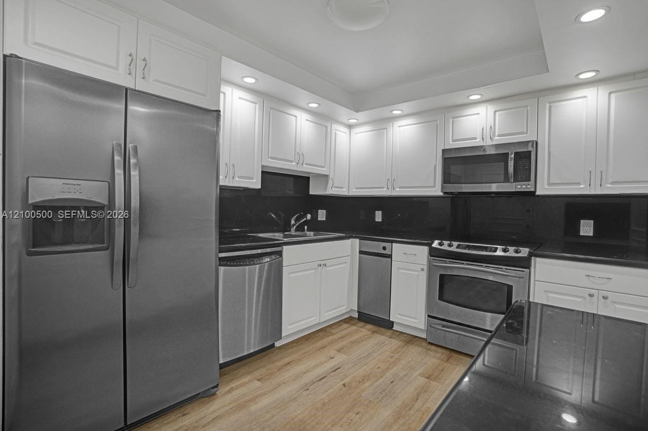 2 Grove Isle Drive B406 — photo 9