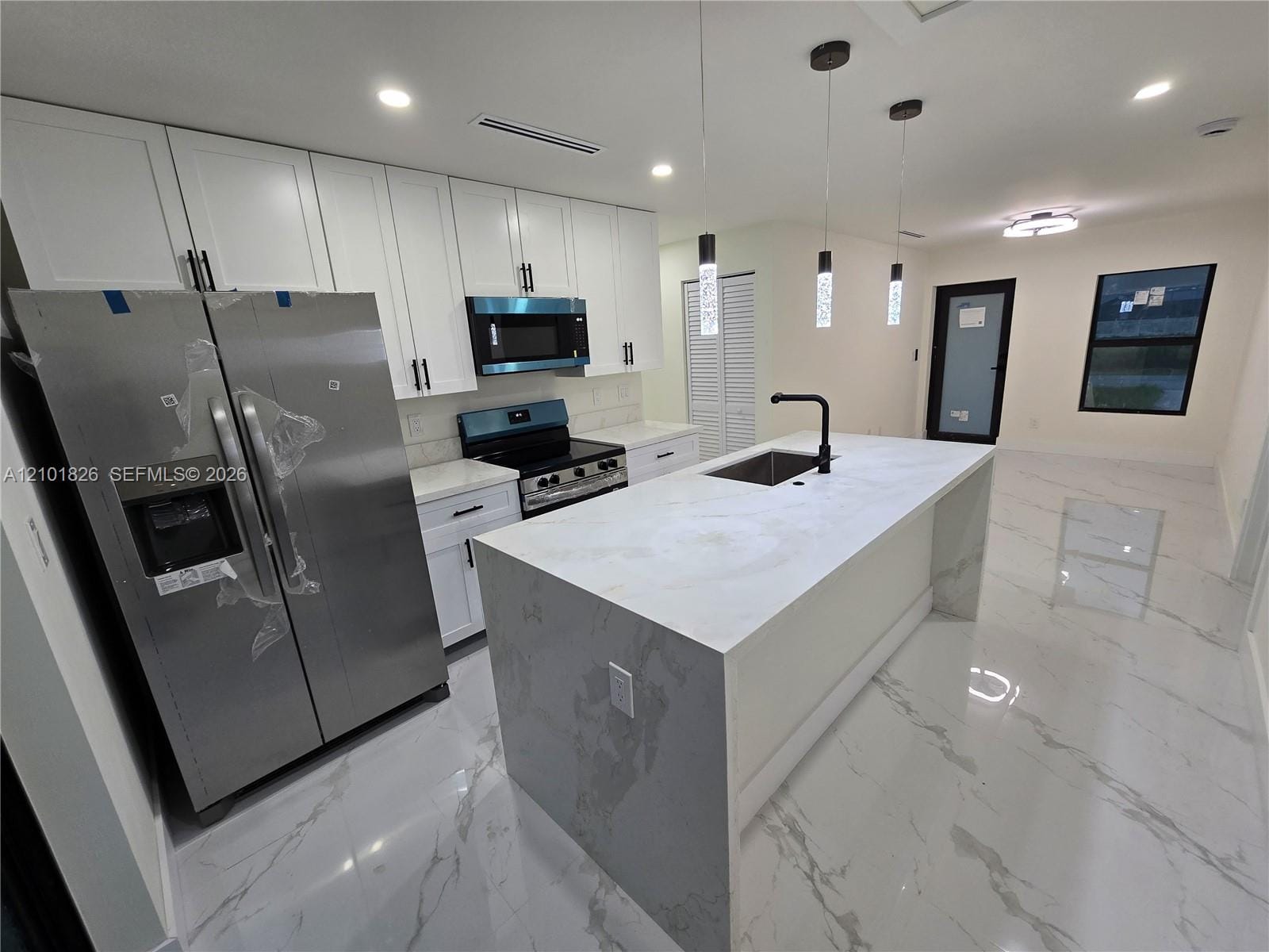 1031 E Hansen, Lehigh Acres, FL 33974 photo 4