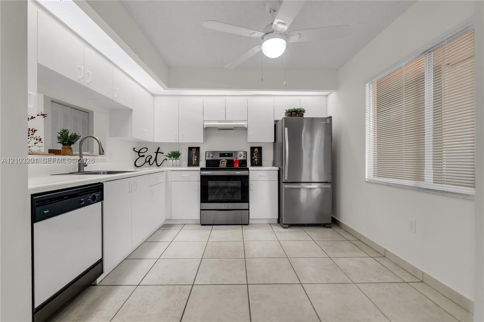 12551 SW 16th Court 107C — photo 8