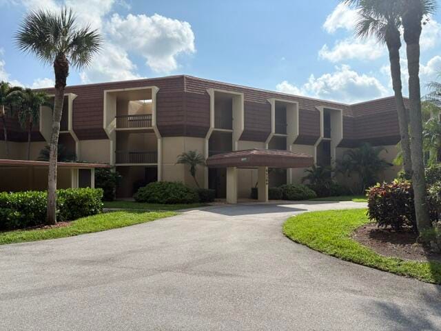 5380 WOODLAND LAKES Drive 216 — photo 12