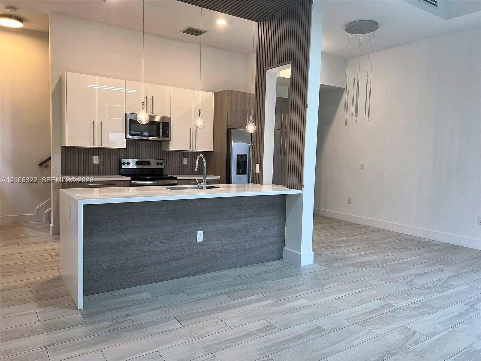 4428 NW 9th Street — photo 3